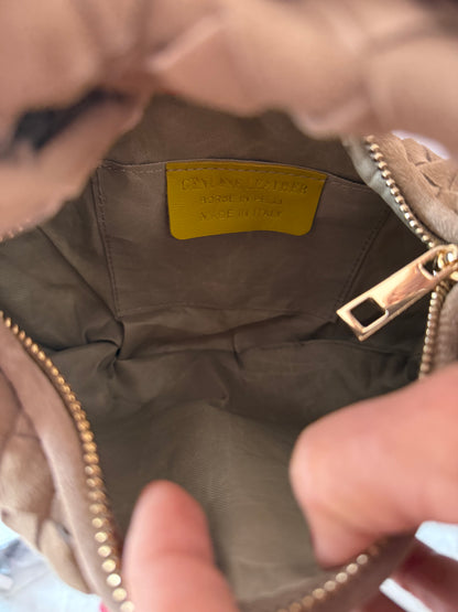 La nodino intrecciata suede